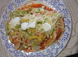Una foto de Enjitomatadas con pollo 🤪