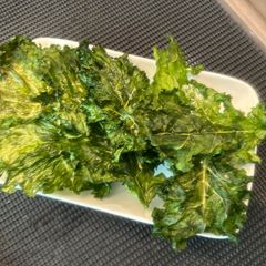 A picture of Ultra healthy - baked kale. Packed with vit C & K, fibre, calcium, iron and antioxidants. - enjoy :P.