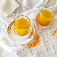 A picture of Turmeric Orange 🍊 Ginger Aamla Shots (Detox, skin glow immunity Drink 🍷).