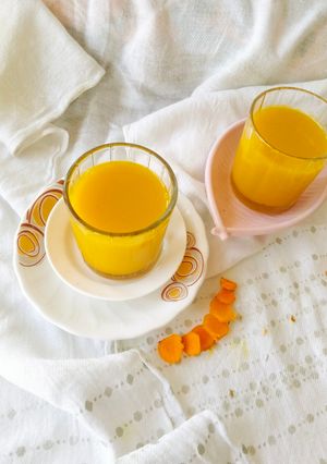 A picture of Turmeric Orange 🍊 Ginger Aamla Shots (Detox, skin glow immunity Drink 🍷).