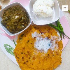 A picture of Makki di Roti te Sarson da Saag.