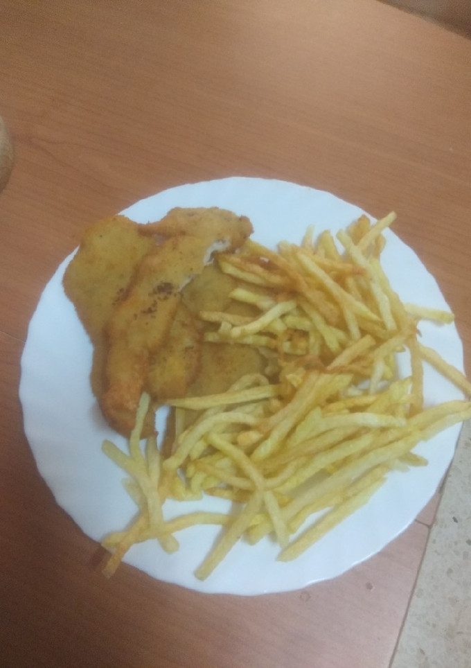 Una foto de Chickens and chips a mí estilo