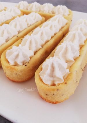 Une photo de Barquettes citronnées aux graines de pavot et chantilly vanillée