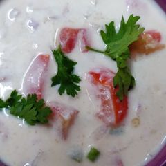 Tomato Raita Recipe | How to make Tomato Raita | Thakkali Thayir Pachadi A picture of Tomato Raita Recipe | How to make Tomato Raita | Thakkali Thayir Pachadi.