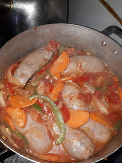 Una foto de Chorizos a la pomarola