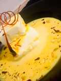 Bhapa Sandesh or steamed sandesh dipped in Rabdi