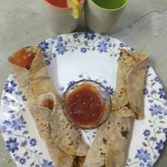 A picture of Chatpati roti sauce with Lemon juice.