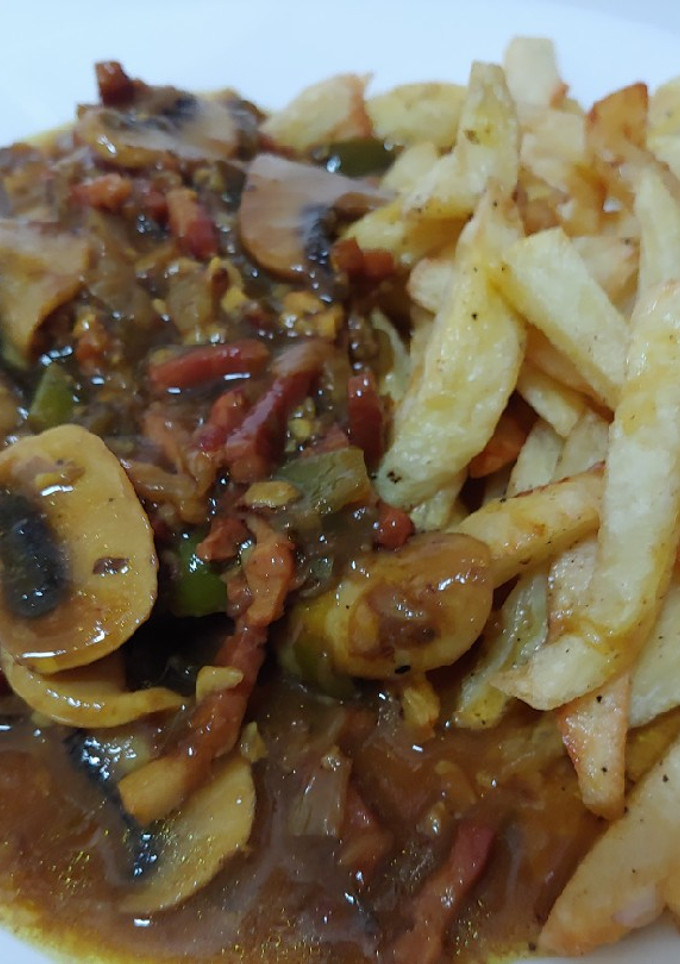 Una foto de Añejo de ternera en salsa Española