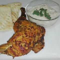 A picture of BBQ Chicken Tikka with Raita.