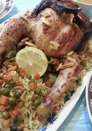 صورة لوصفة رز الاوزي مع دجاجة مشوية بالقنينه