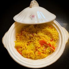 A picture of Alu Aur Tamatar Pulao Potato and Tomato Pilaf.