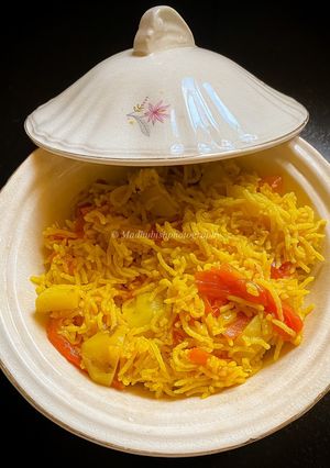 A picture of Alu Aur Tamatar Pulao Potato and Tomato Pilaf.