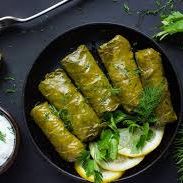 A picture of Dolma (stuffed grape leaves) (Azerbaijan).