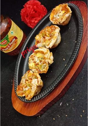 A picture of Pizza Cups in Appam Pan.