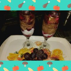 A picture of Fruits with Jelly with vanilla ice cream n chocolate ice cream.