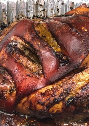 Una foto de Pernil asado con Cerveza