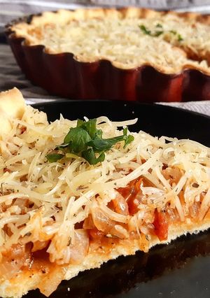 Une photo de Tourte aux oignons et aux tomates