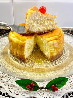 Una foto de Pastel de queso con streusel de almendra