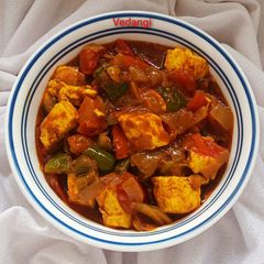 A picture of Paneer, Onion and Capsicum sabzi.