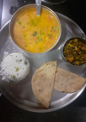 A picture of Dal fry jeera rice with karari bhindi.