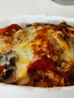 A picture of Baked Rice With Tomato Sauce and Cheese.