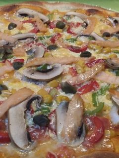 Una foto de Pizza capricho