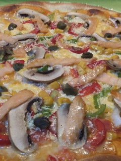 Una foto de Pizza capricho