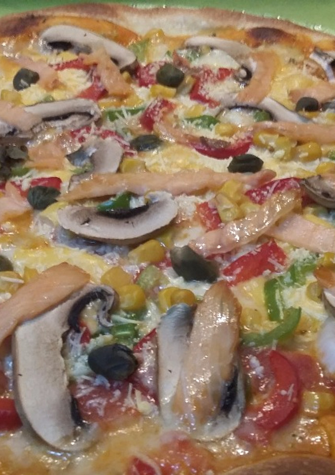 Una foto de Pizza capricho