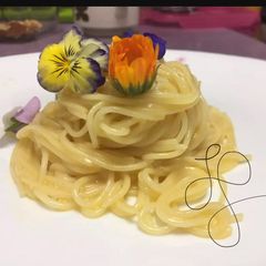 A picture of Carbonara With Edible Flowers.