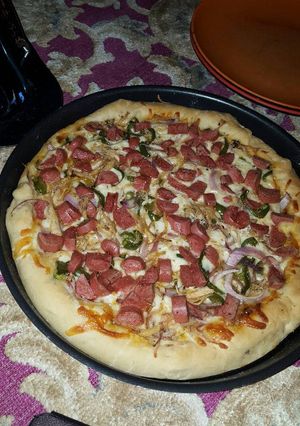 A picture of Chicken & Sausage Pizza with Cheese Crust.