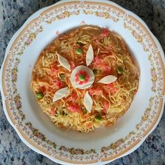 Egg Maggi Pizza A picture of Egg Maggi Pizza.