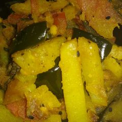 A picture of Bitter gourd brinjal potato stir fry.