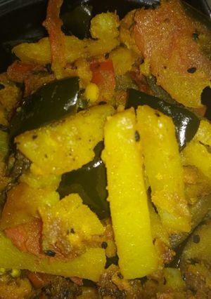A picture of Bitter gourd brinjal potato stir fry.