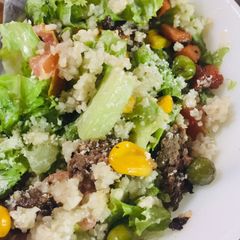 A picture of Lamb Burger Bulgur Salad with Roasted Sesame Mayo Dressing.
