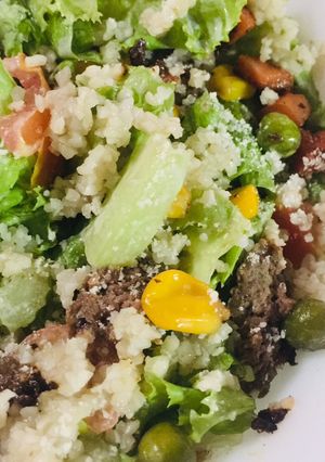 A picture of Lamb Burger Bulgur Salad with Roasted Sesame Mayo Dressing.