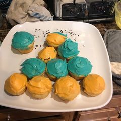A picture of Amazing moist vanilla cupcakes with buttercream frosting!.