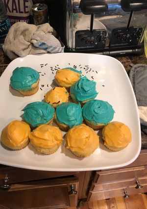 A picture of Amazing moist vanilla cupcakes with buttercream frosting!.