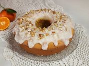 Una foto de budín de mandarina glaseado