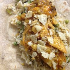 A picture of Burritos with Spiced rice and salsa.