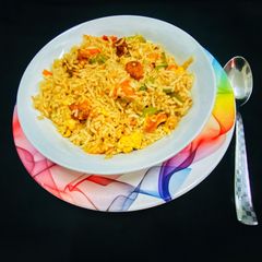 A picture of Chicken fried rice.