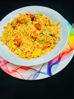 A picture of Chicken fried rice.