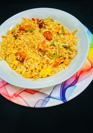 A picture of Chicken fried rice.