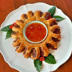 A picture of Thai style Sausage Roll WreathVegan friendly too!.
