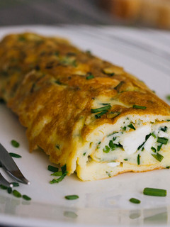 Una foto de Tortilla de queso Feta y cebollino