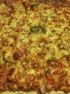 Una foto de Pizza barbacoa