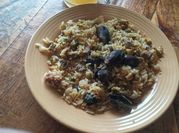 Una foto de paella de chorito