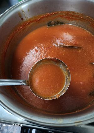 Una foto de Salsa roja de tomate zapallo y zanahoria