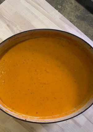 A picture of Tomato and carrot soup.