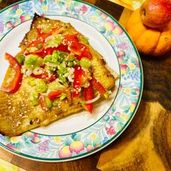 A picture of Stingray wings in sesame seeds in the oven.