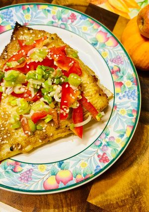 A picture of Stingray wings in sesame seeds in the oven.
